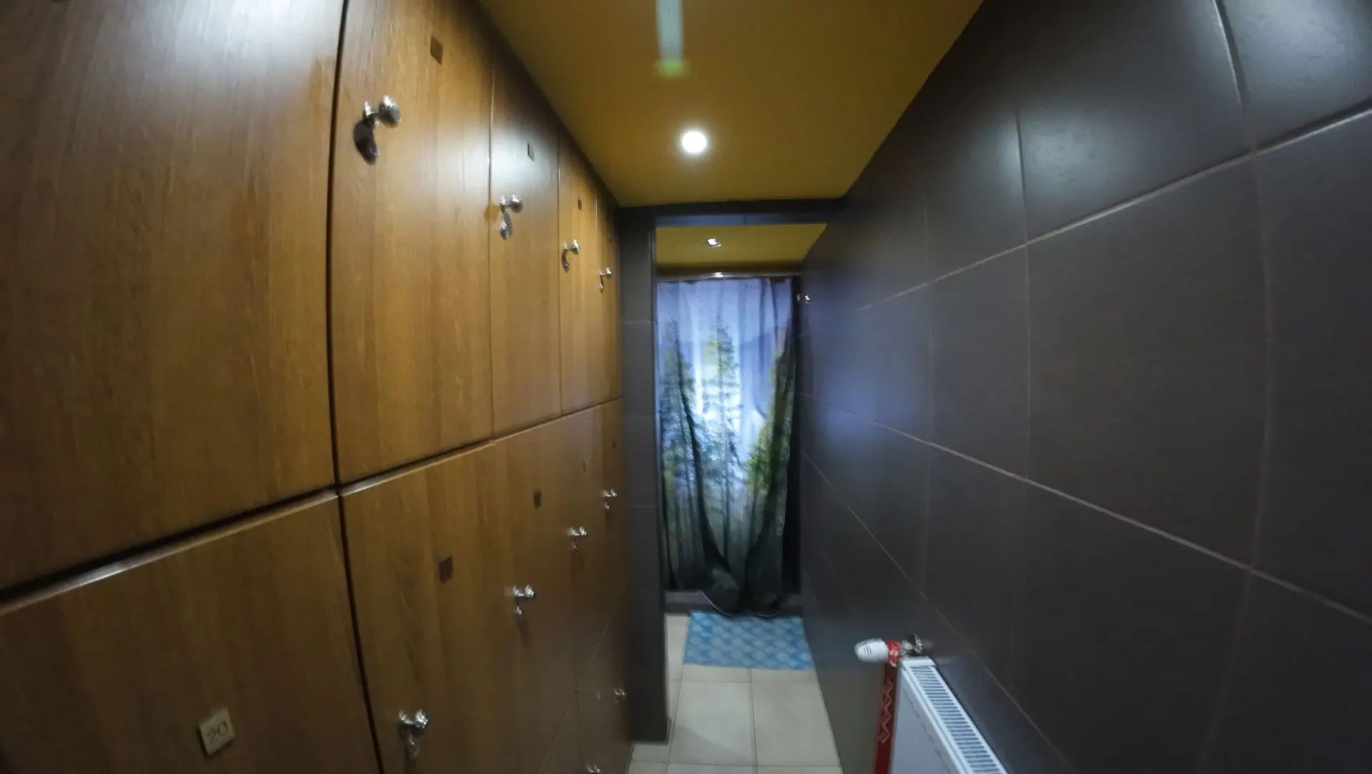 Row of lockable wooden lockers in the changing room